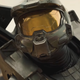 A Halo spartan crouches in a complex.